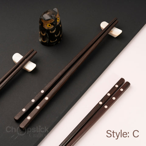 Rosewood chopsticks and red leather bag in cherry blossom style