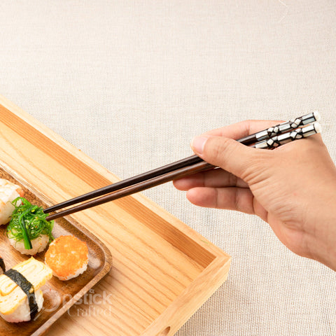 Natural Trac wood chopsticks with abalone head. Free Personalized Engraving